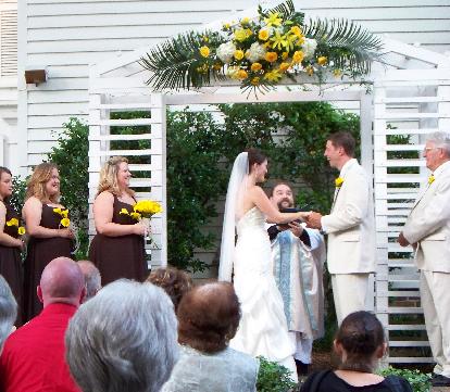 Fr. Geof making a nervous couple laugh.